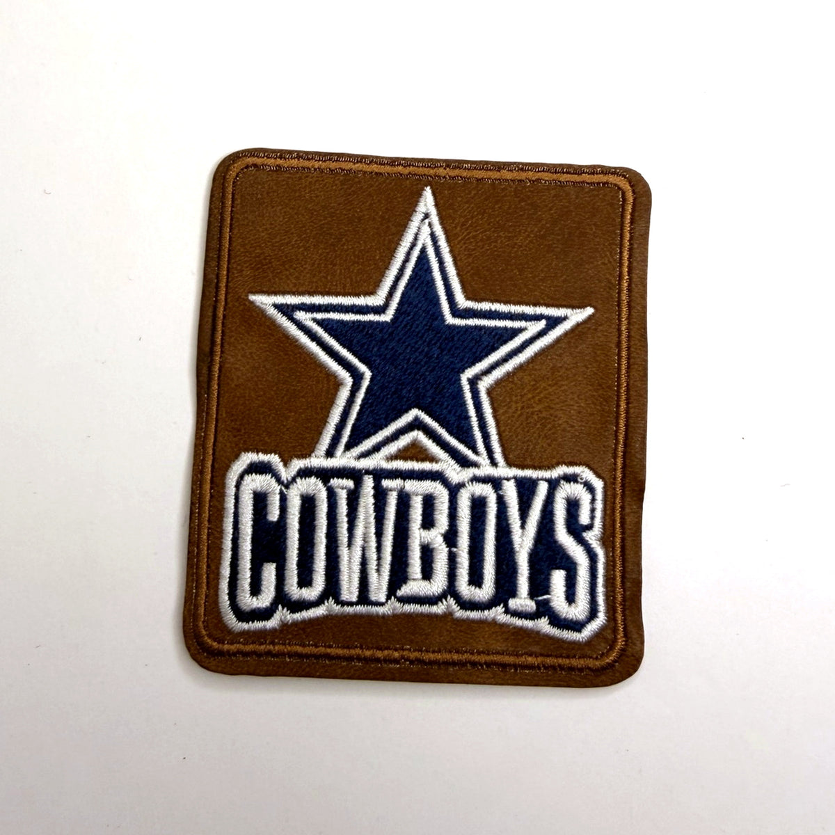 Brown star patch with navy lettering