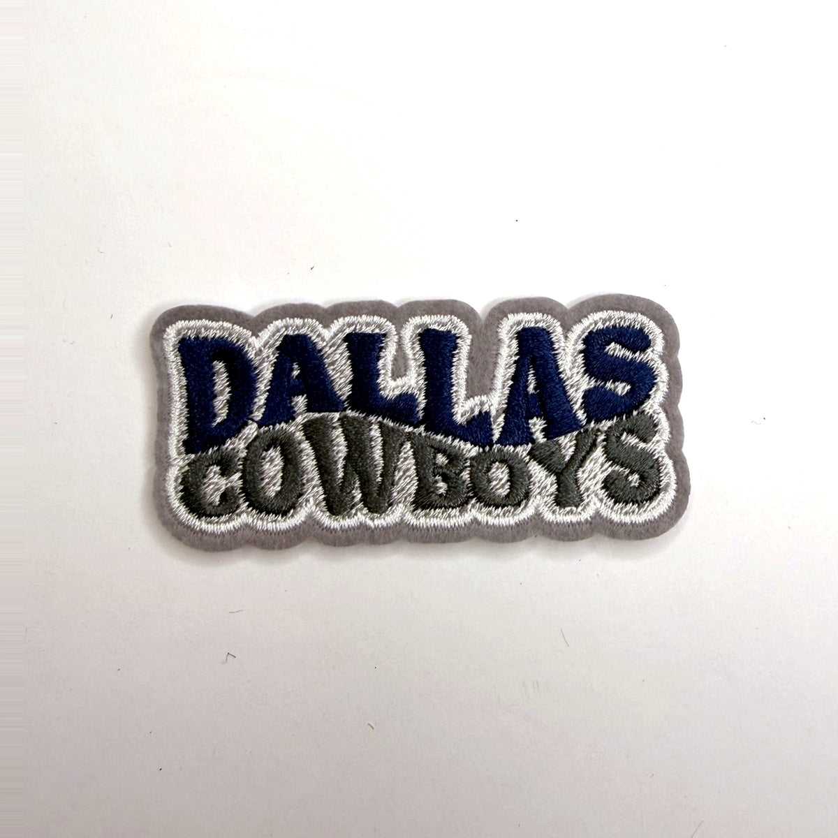 Navy wavy lettering patch