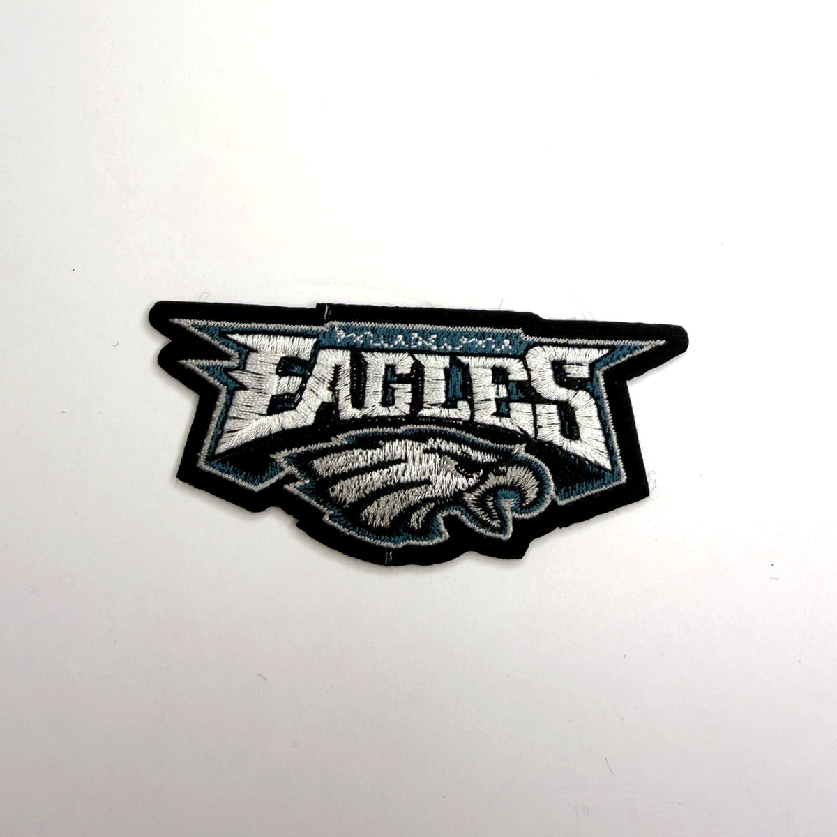 Teal and white eagle head banner patch