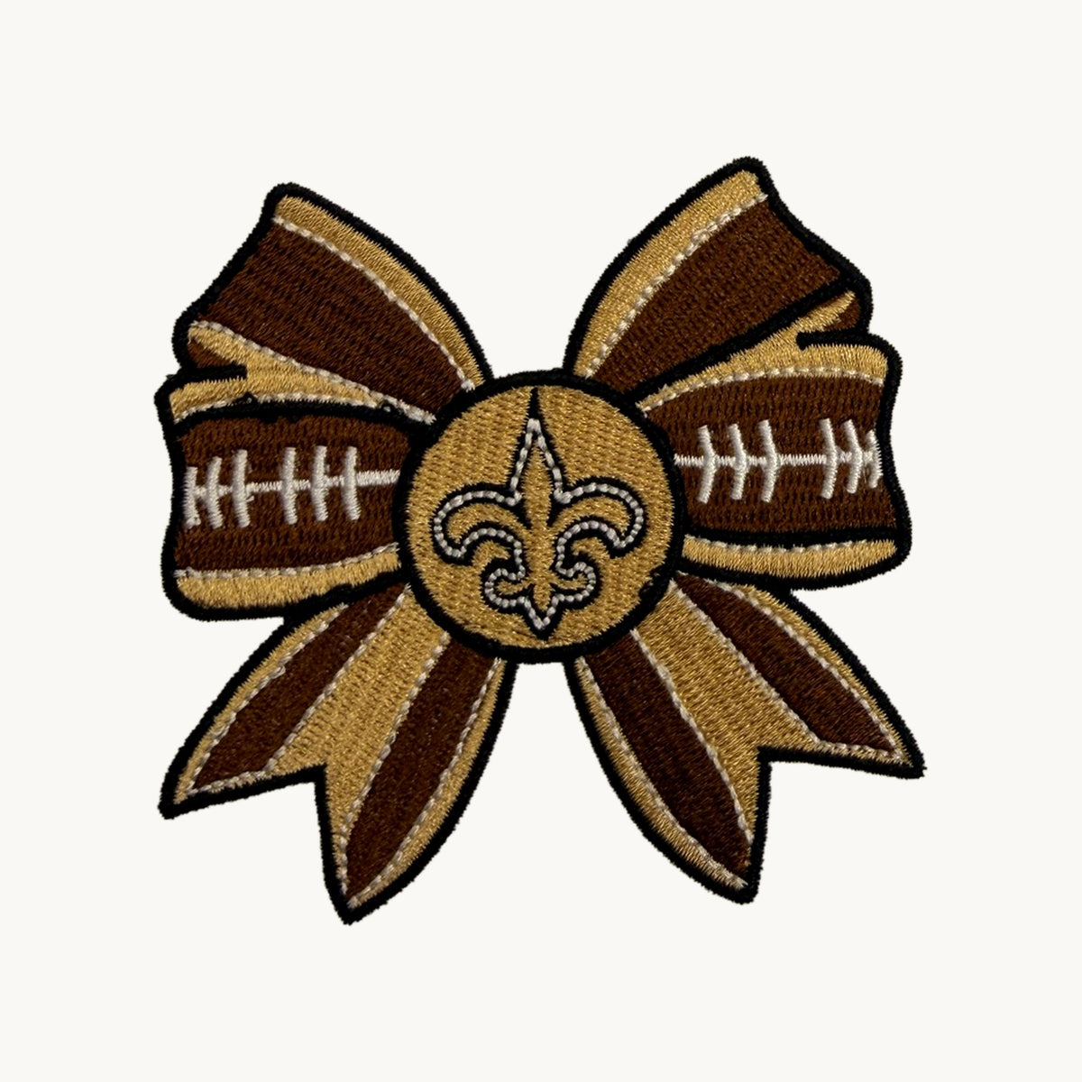 Brown and gold football bow patch with fleur-de-lis center