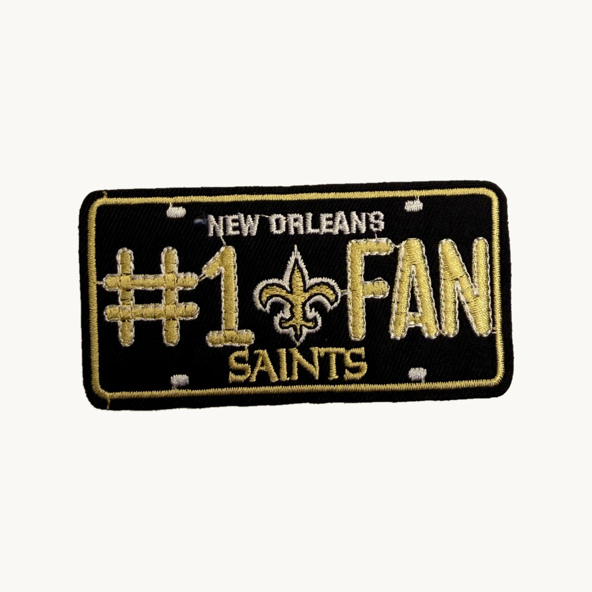 Black and gold number one fan plate patch